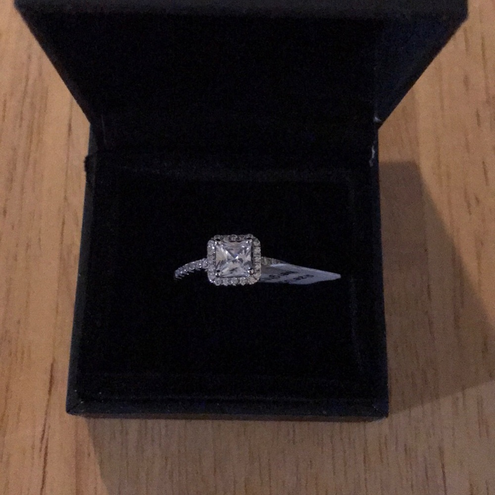 Princess cut white sapphire ring
